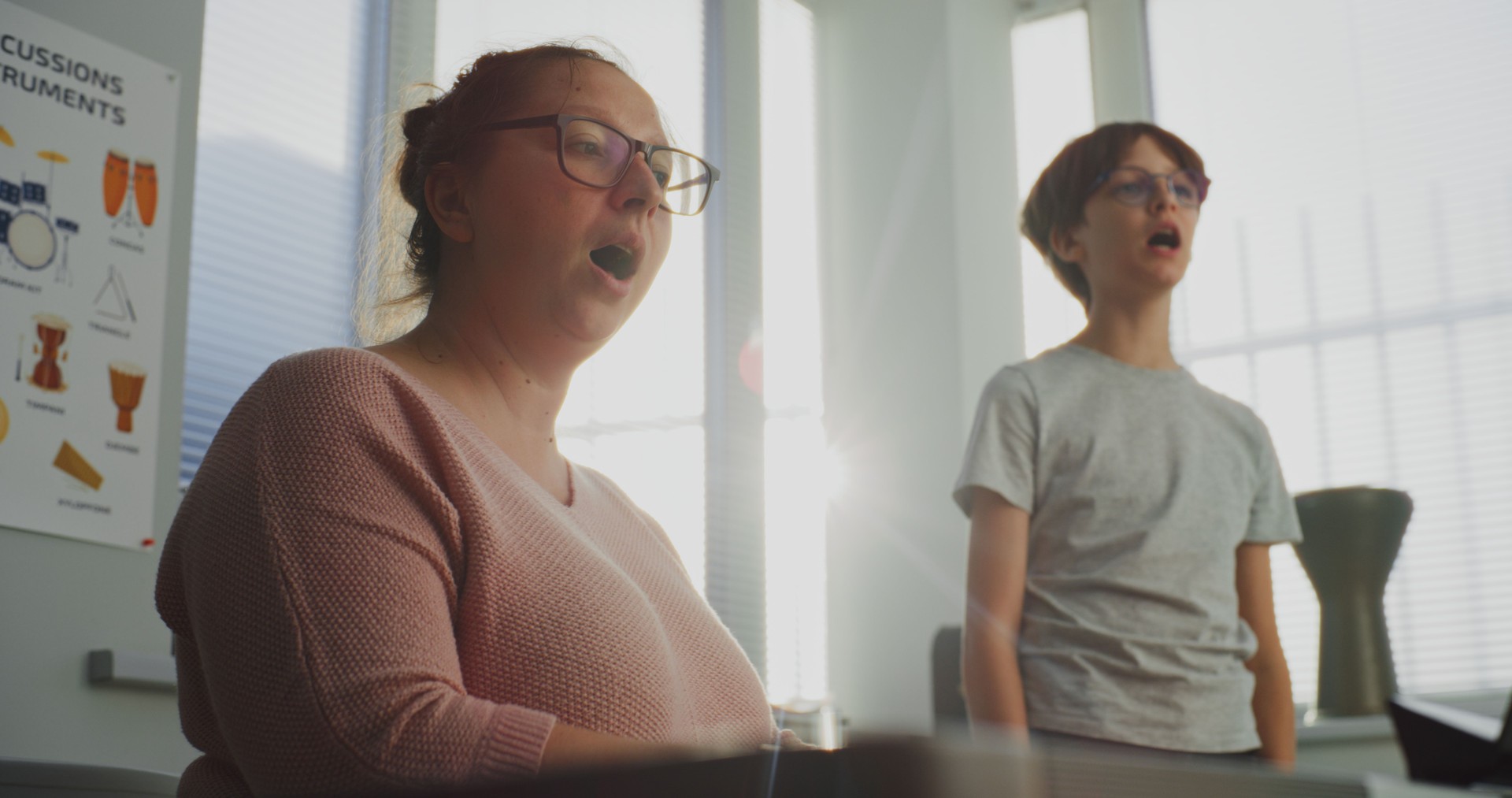 Talented Boy Singing Song During Vocal Lesson. Music Teacher Playing Piano, Training Young Student